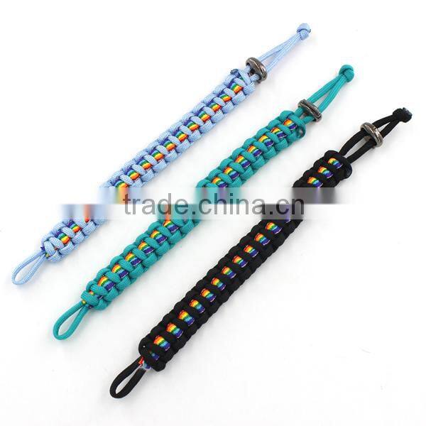 paracord bracelet with rainbow band and adjustable closure