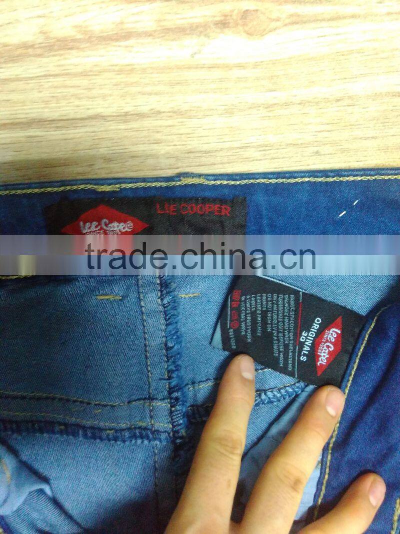 GZY Guangzhou stock lots wholesale ripped stretch women jeans
