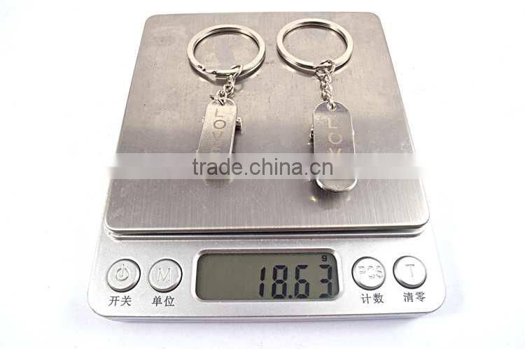 promotional items custom logo metal skateboard keychains