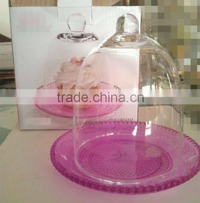 clear small glass bell with cake stand