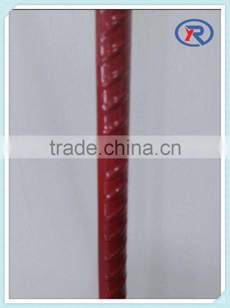red painted steel picket fence post