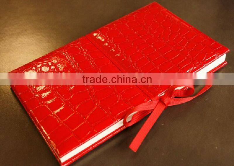A5 PU leather hard cover notebook with foil stamping and embossing stars