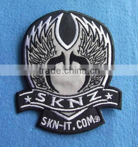 factory made personalized design 100% embroidery uniform textile patches with self adhensive backside