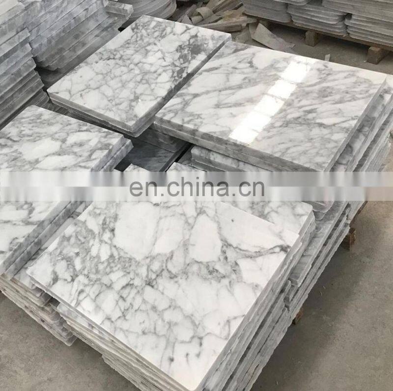 chinese cheap white marble flooring slab tiles price design