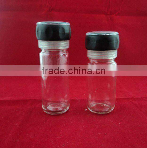glass spice grinder, salt shaker and oil dispenser