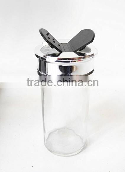 small clear glass paragon spice jars with butterfly cap