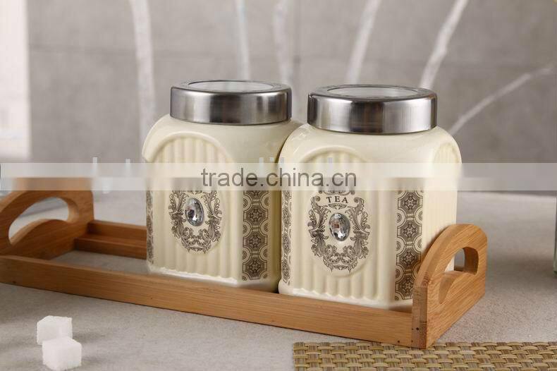square ceramic canister set with bamboo stand