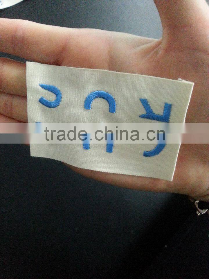 2015 high quality free machine embroidery label designs clothing label