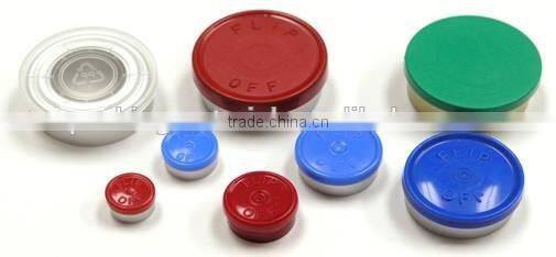 Flip-off cap of aluminium and plastic for glass infusion bottle