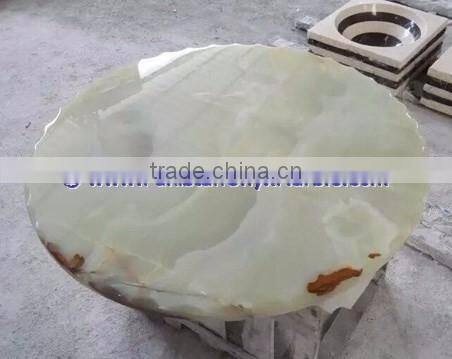A GRADE LIGHT GREEN ONYX TABLE TOPS COLLECTION