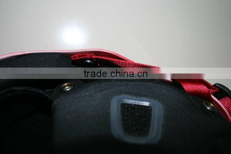 skiing helmet with nylon strap and removable ear protectors