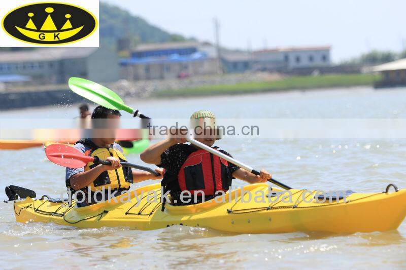 professional plastic two person sit in sea kayak double kayak