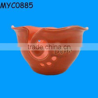 Ceramic pink bowl as yarn closet organizer