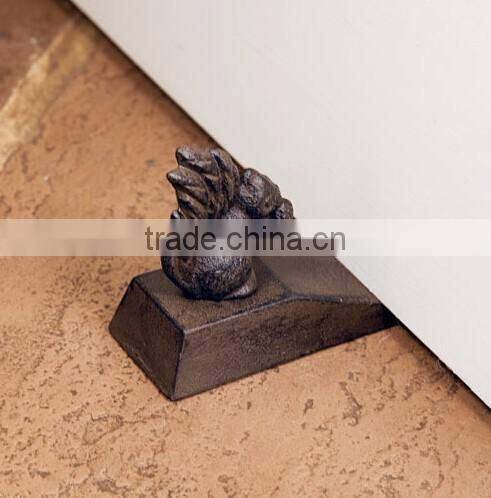 The cast iron mouse door stop