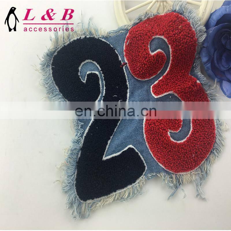 New design wholesale towel embroidery patch with denim