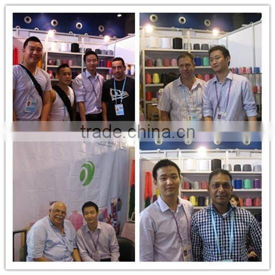 Dyed spun polyester yarn for woven tape knitting