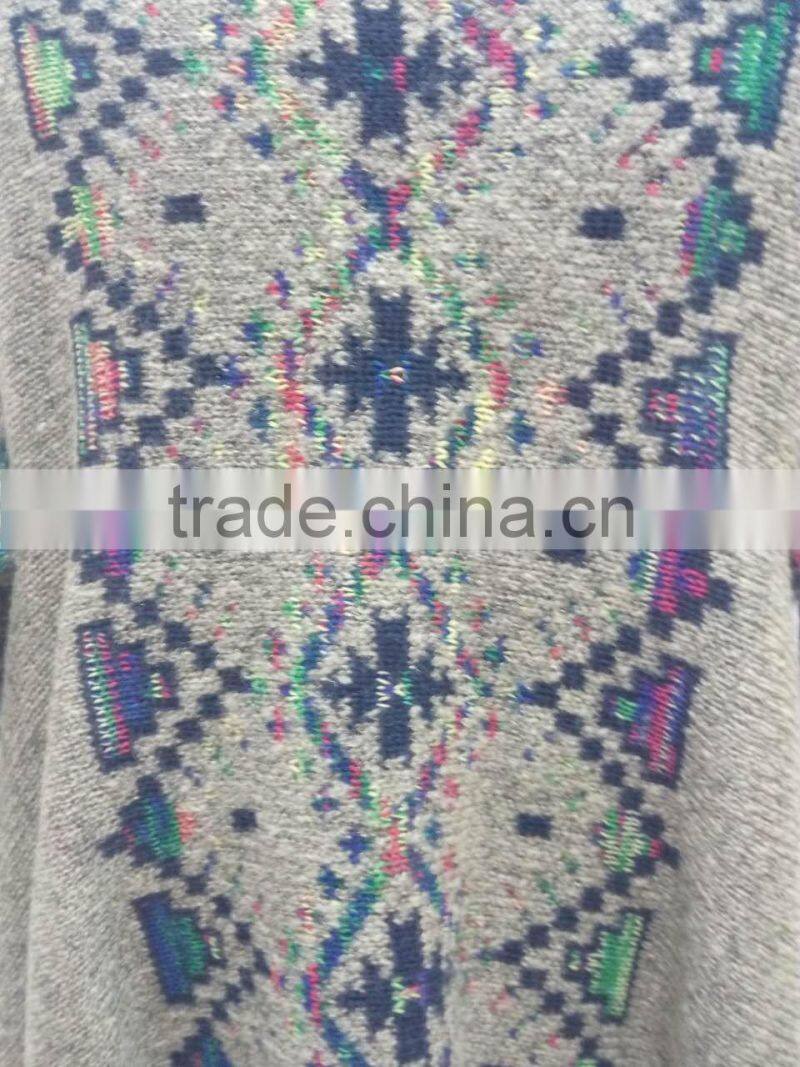 Ladies elegant multi color knitted cardigan with fringes