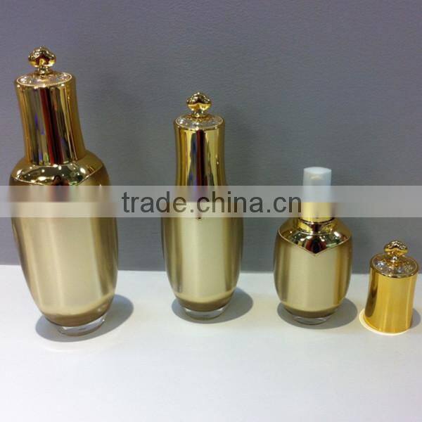 2014 hot sell crown shape cosmetic lotion bottle acrylic lotion bottle with pump