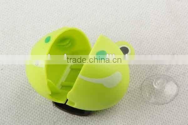 Frog shaped plastic toothbrush holder