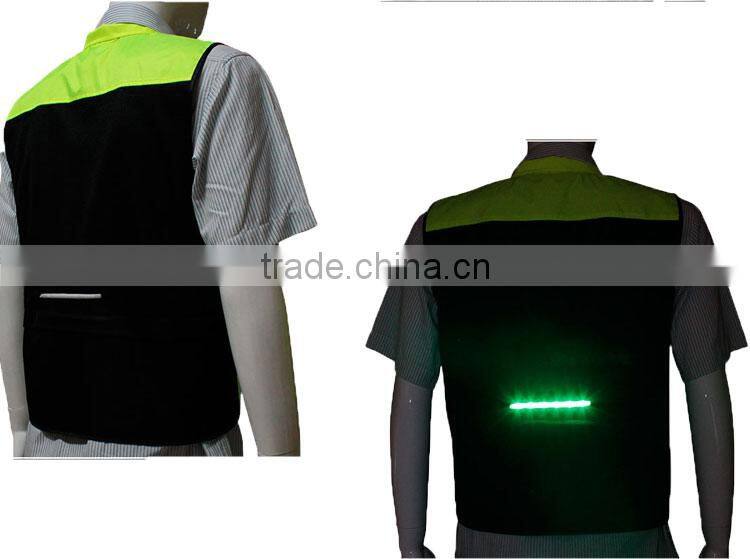 USB rechargeable battery heated reflective vest for running or cycling