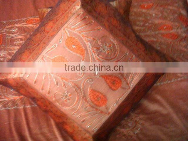 Hand embroidered cushion cover