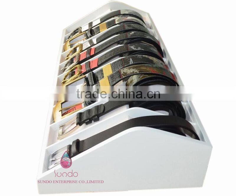 custom white lacquered wood belt display