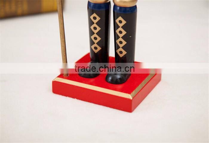 Handsome nutcracker soldier, christmas decorating wooden nutcracker