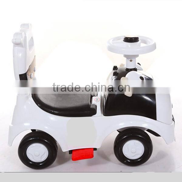 Hot sales CE approved children swing car,4 wheels cartoon cow children tricycle bicycle toys baby swing car with music