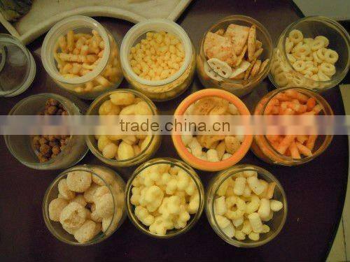 Extruded corn puffed snack food processing machinery
