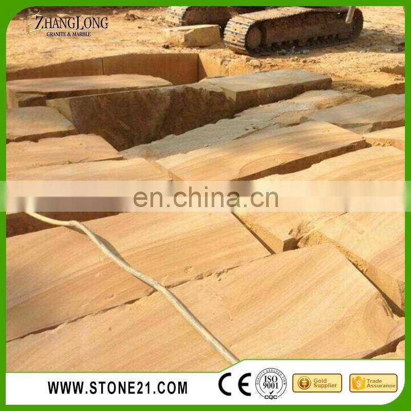 sandstone cladding, rusty yellow sandstone