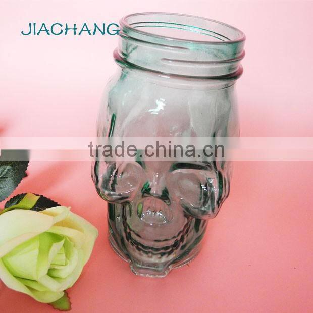 blue skull shape glass beverage coffee jar with blue tin lid