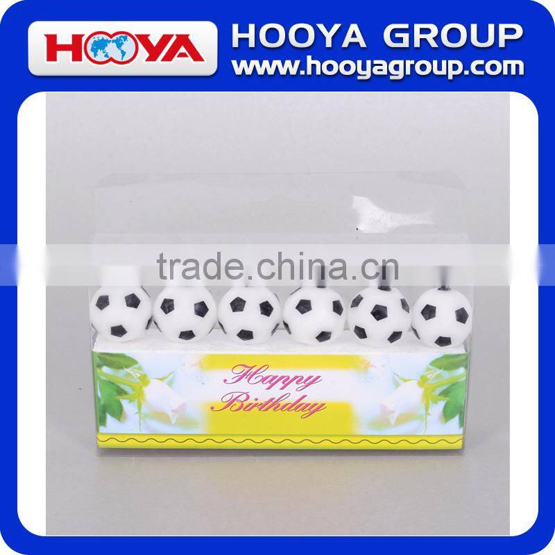 Football shaped birthday candle for party