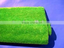 different color plastic grass mat in roll