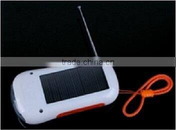 led solar dynamo flashlight with radio