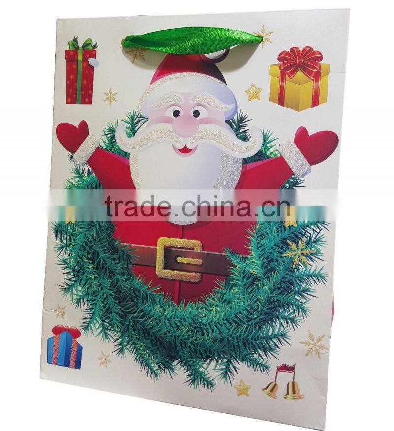 glittered paper shopping bag with Santa printing