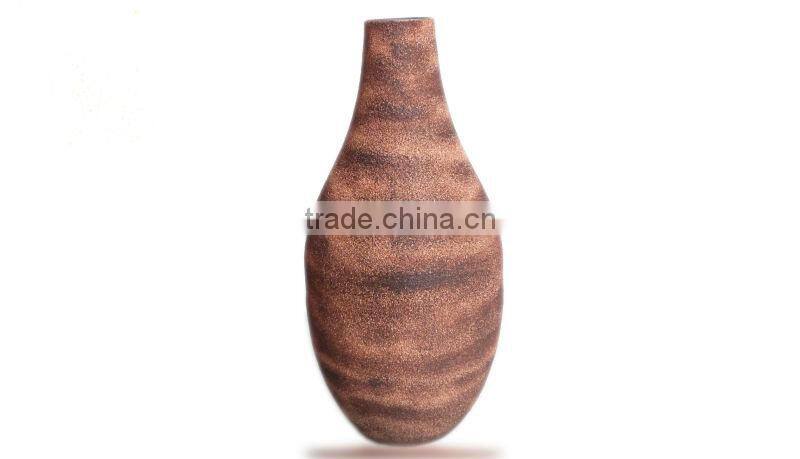 Contemporary handmade metal vase for home decoration
