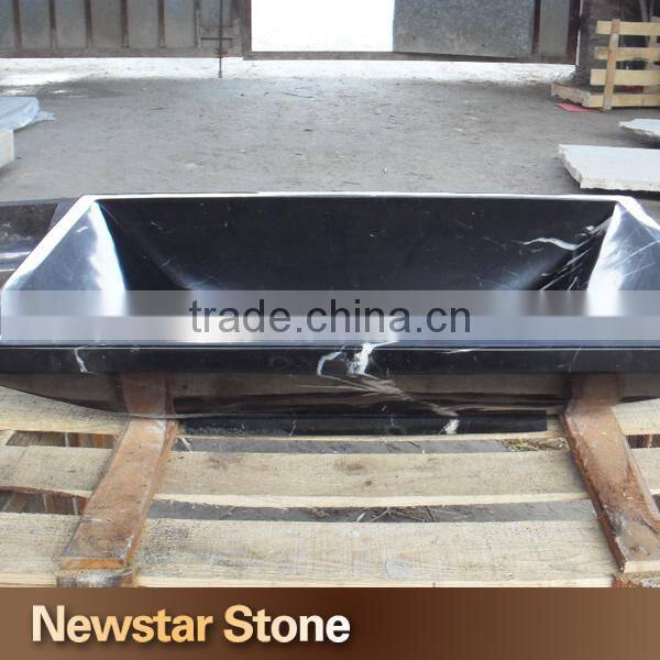 Chinese polished black carved marble sink