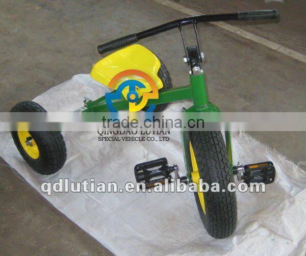kids green tricycle