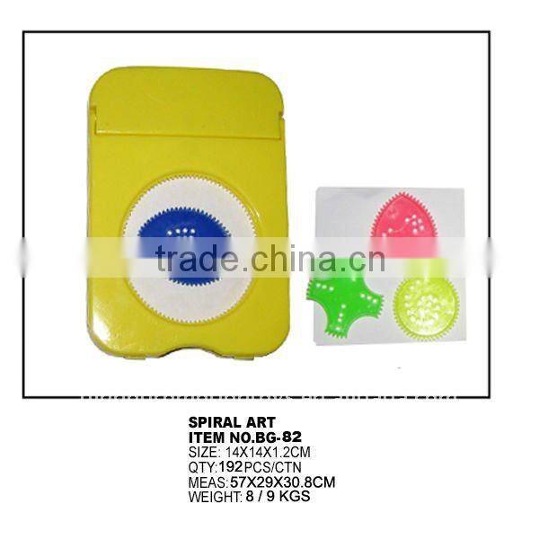 plastic spirograph toys with papers