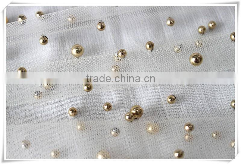 New arrival Transparent tulle soft beige net fabric with gold beads for Girl's dress