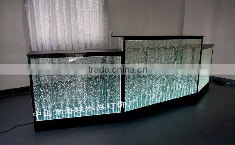 fatastic hotel frond desk receiption with led lights and water bubble moving.