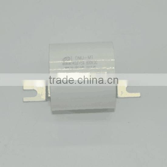 Film capacitor, DC link capacitor, spot weld capacitor
