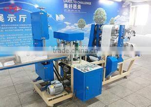 Two color napkin paper machine sanitary napkin making machine
