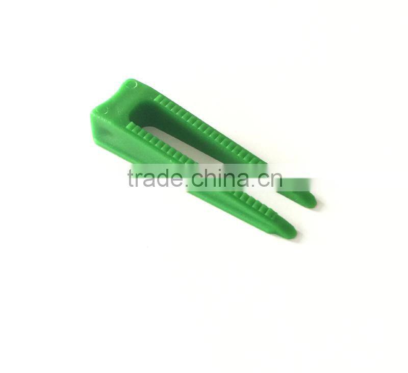 Tile leveling system, plastic leveling system