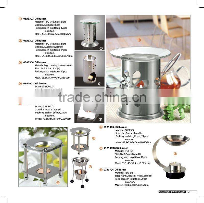 Four slender silver metal stylishly aromatherapy oil burners