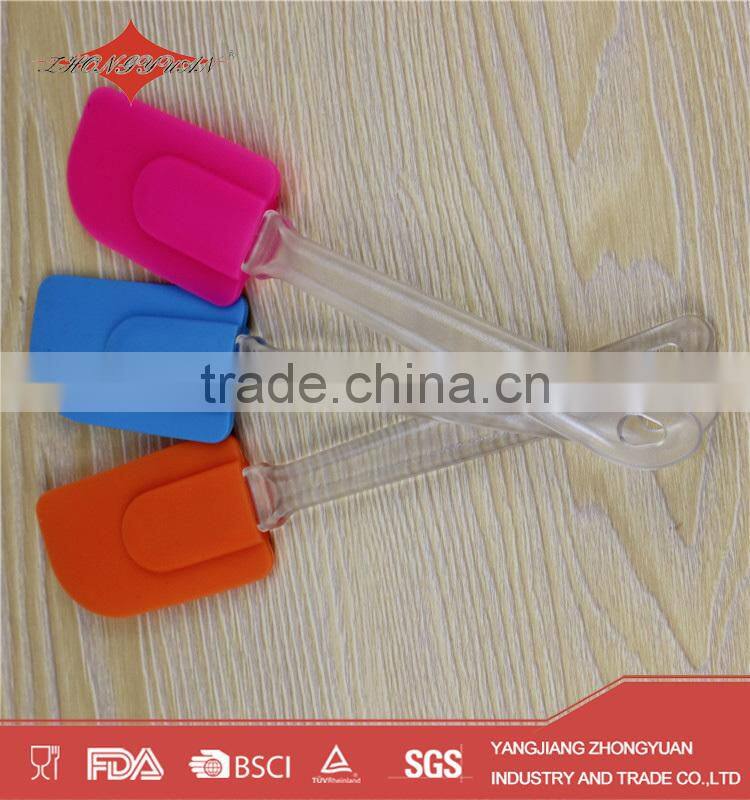 blue silicone spatula with plastic handle