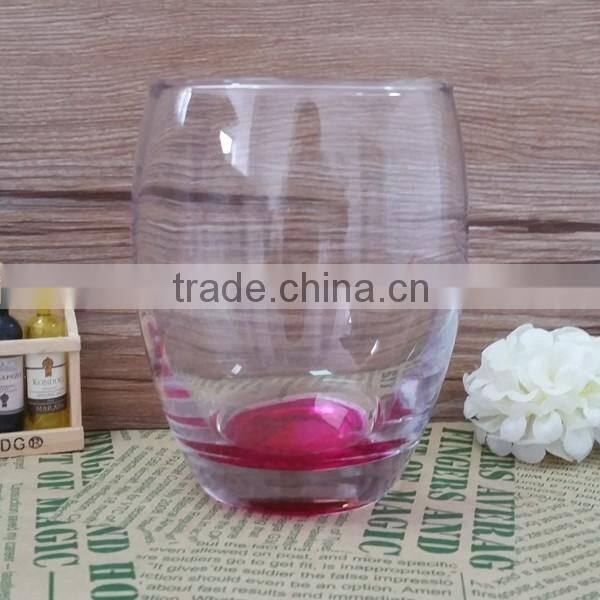 Clear egg shape glass tumbler with 400ML capacity and color bottom