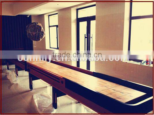 Shuffleboard table game machine