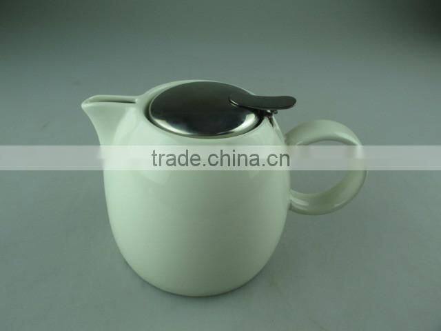 white round porcelain tea pot with stainless steel lid