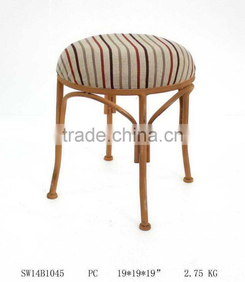 tubular metal chair with linen cushion